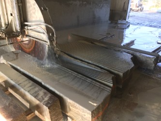Gang saw cutting Pennsylvania bluestone slabs at the Burke Stone shop